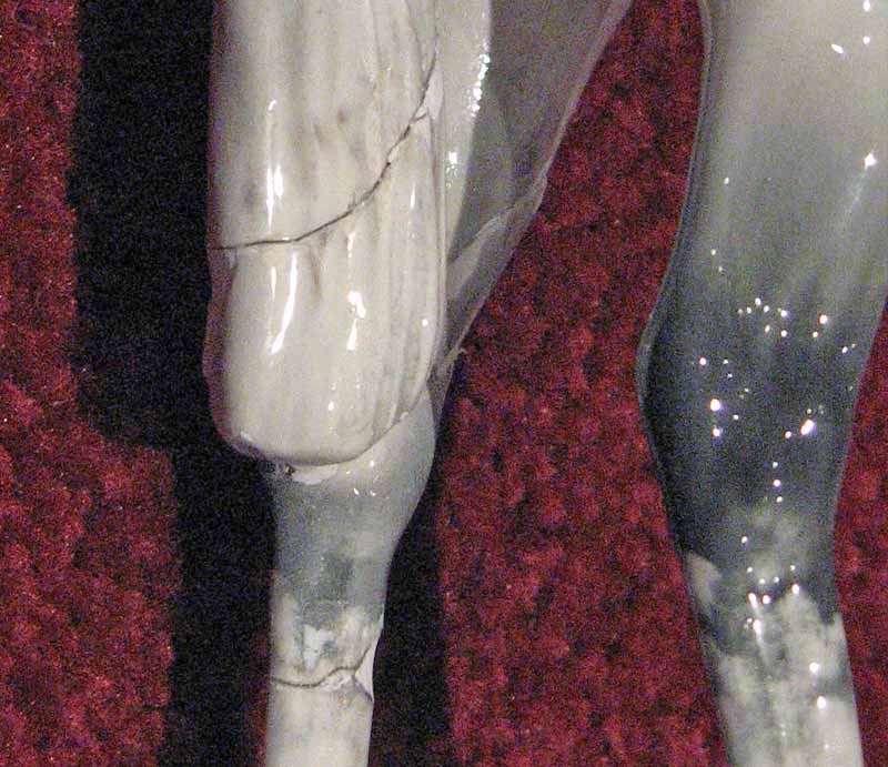 Beswick Horse and Jockey Badly glued tail and leg with visible crack.